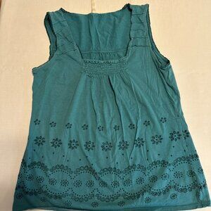 Green sleeveless top with eyelet detailing